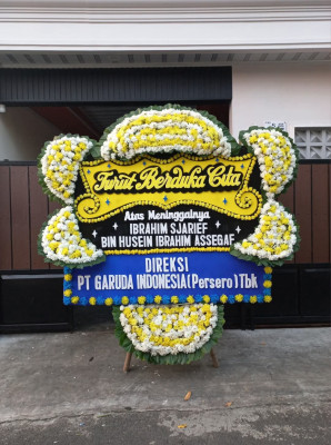 Papan Bunga Duka di Tanon